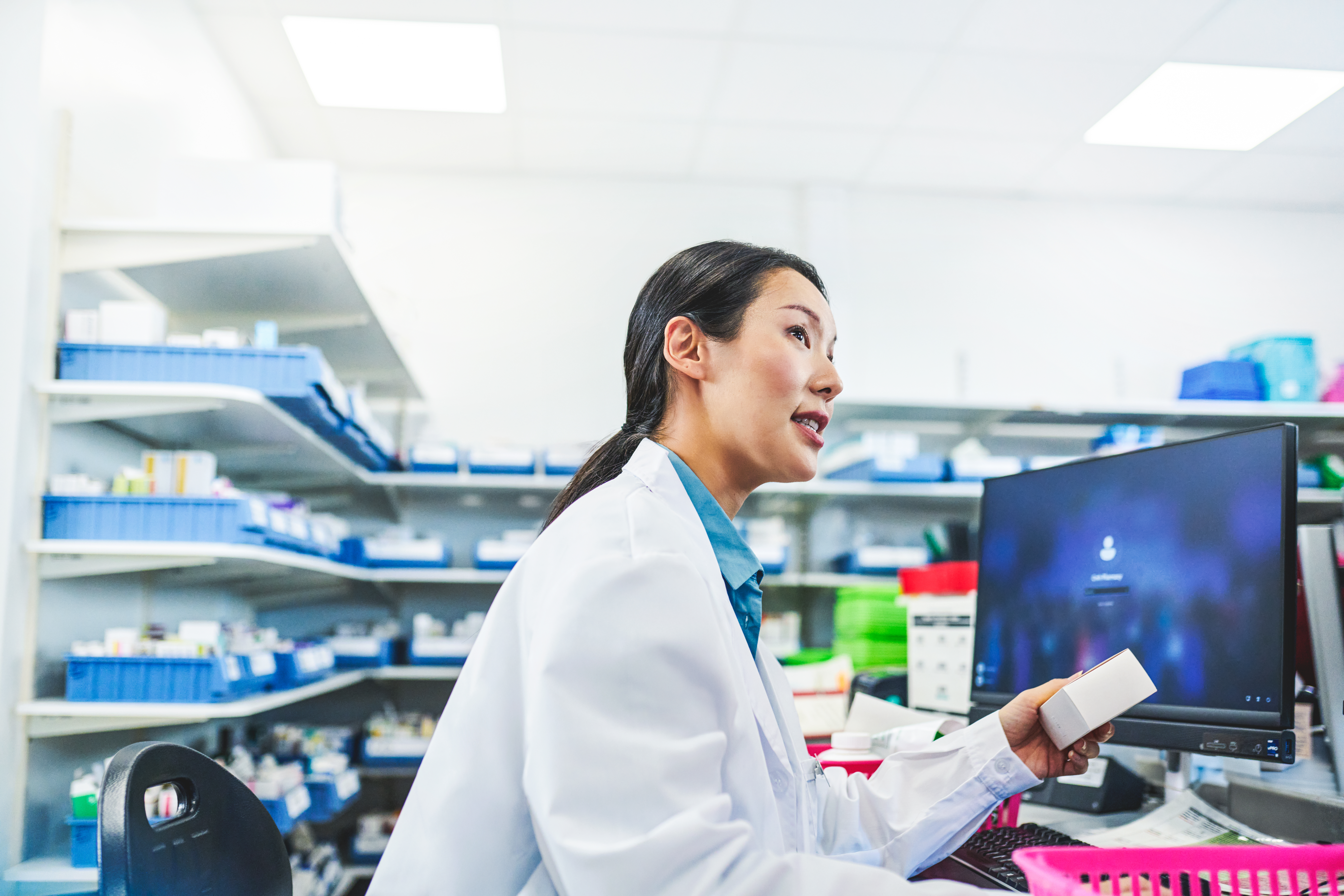 Pharmacist taking order from the client