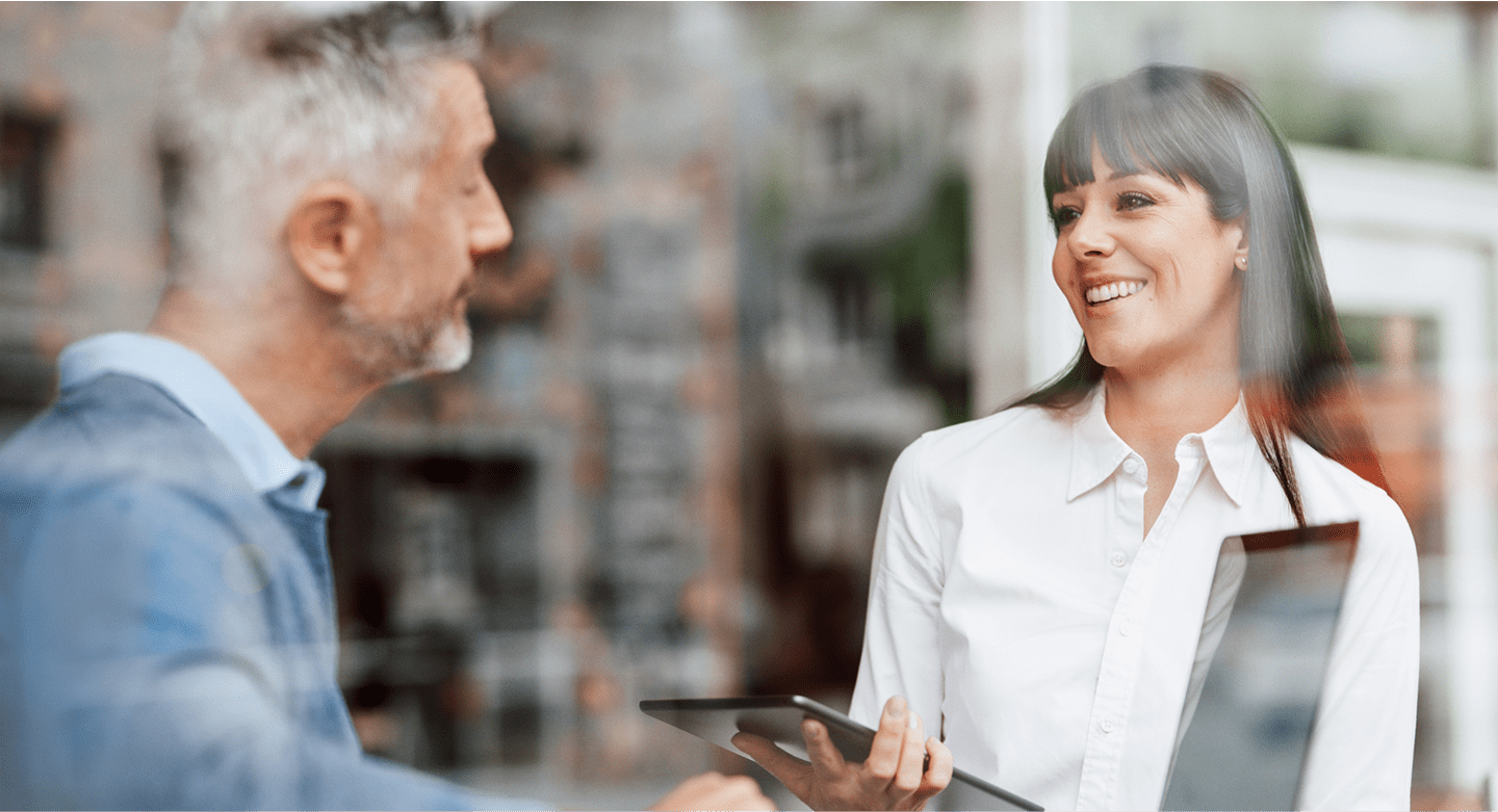 Two people pleasantly talking