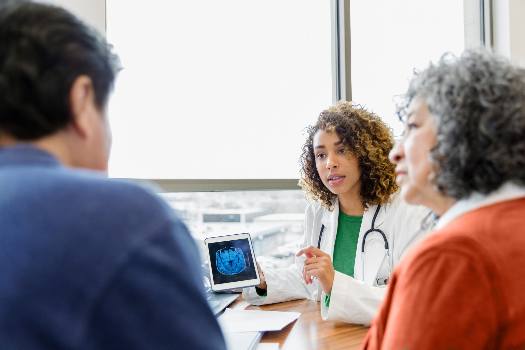 Physician reviewing patient information in a clinical office