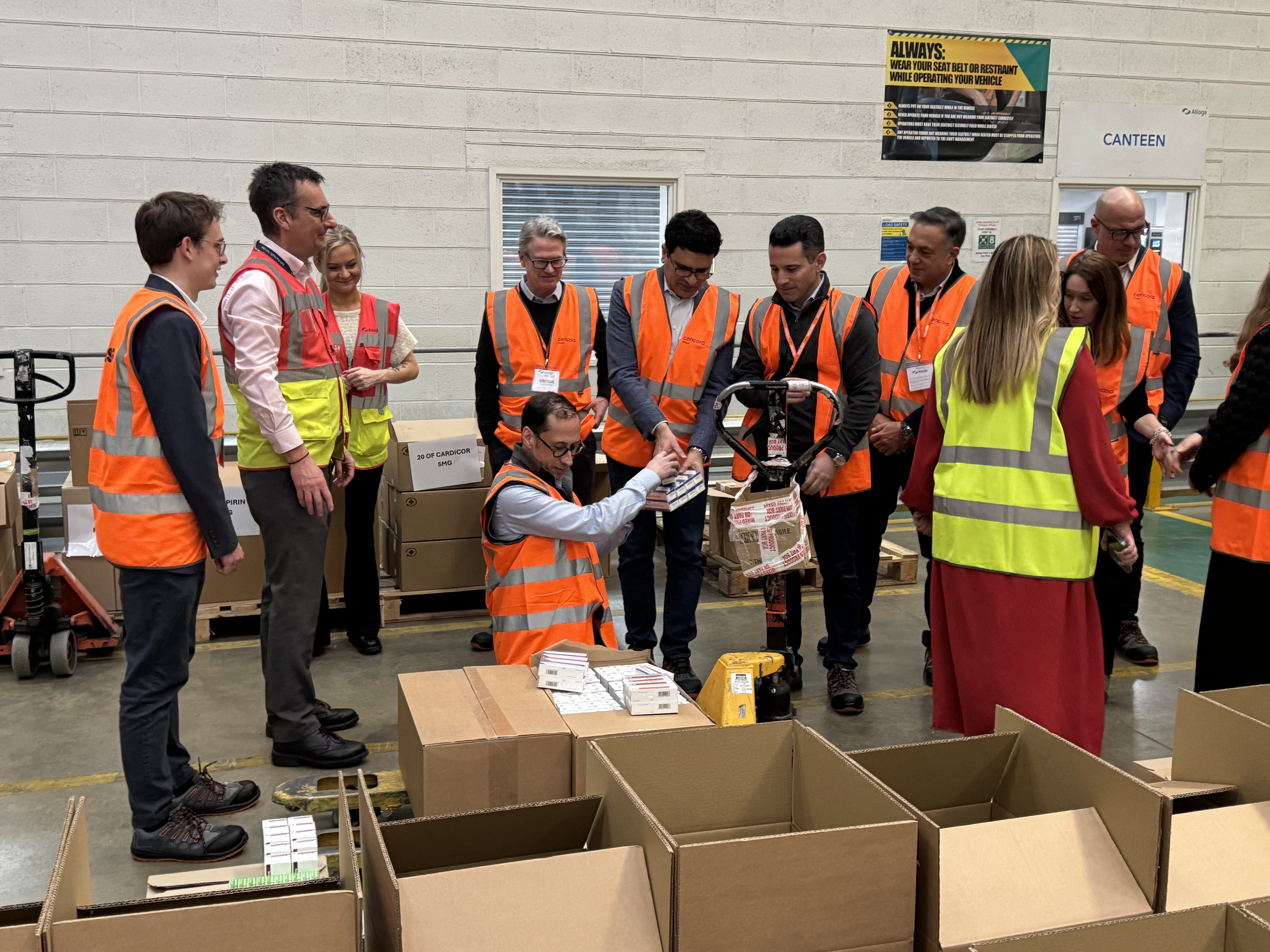 Warehouse workers having a meeting