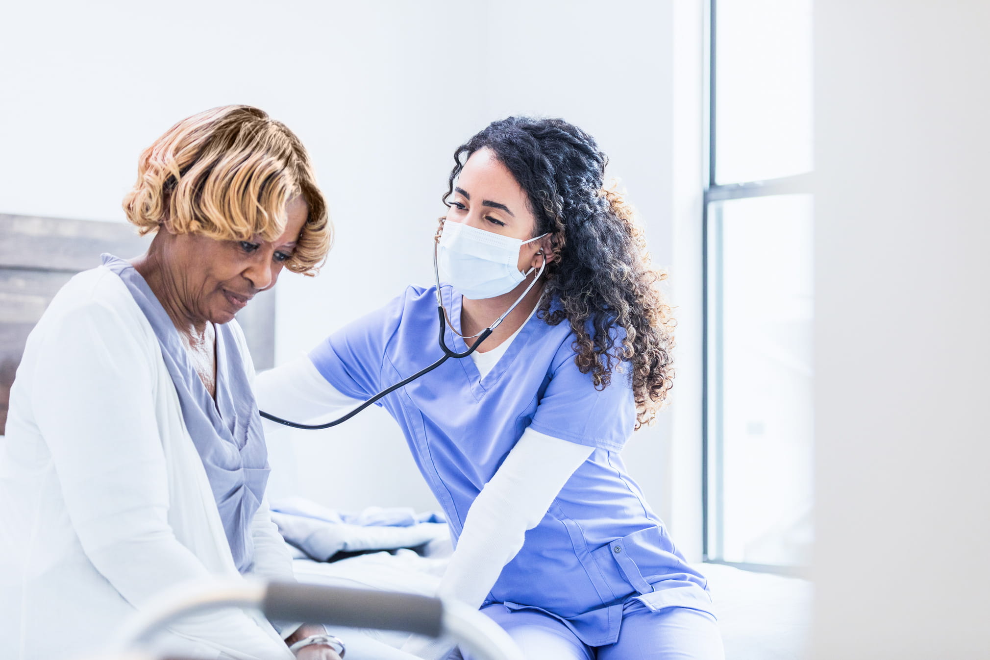 Doctor taking vitals of a patient