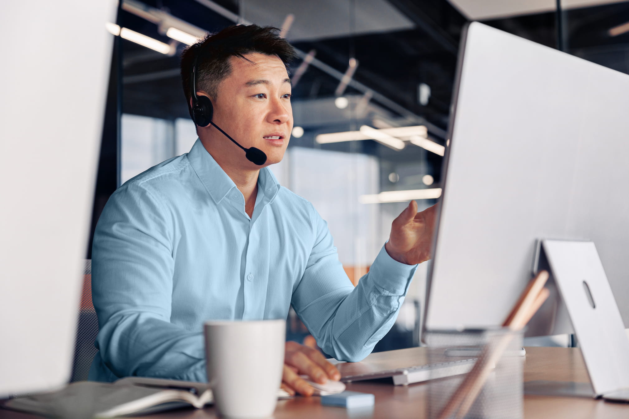 Customer success manager looking at the computer
