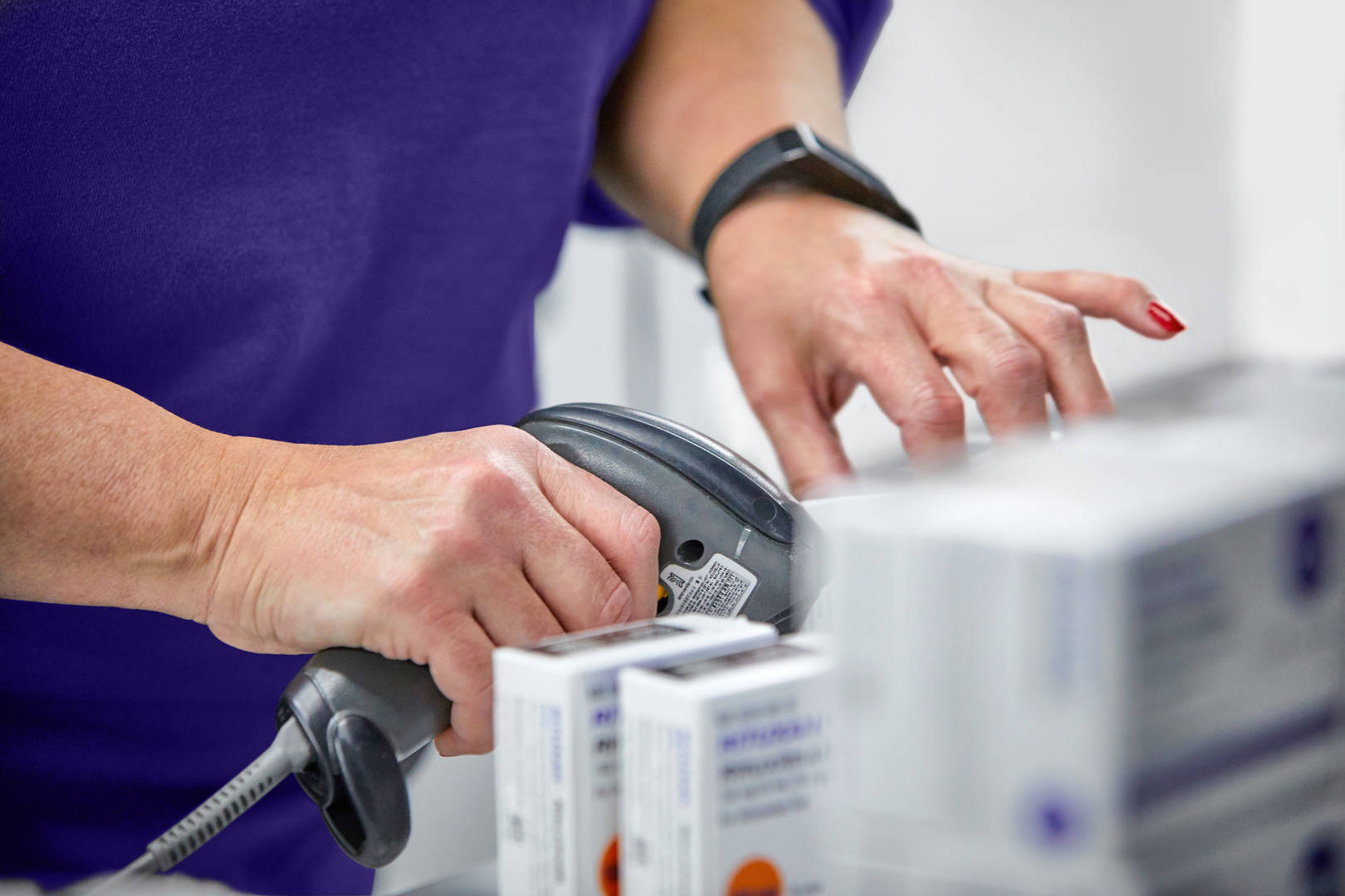 Cencora associate performs quality controls.